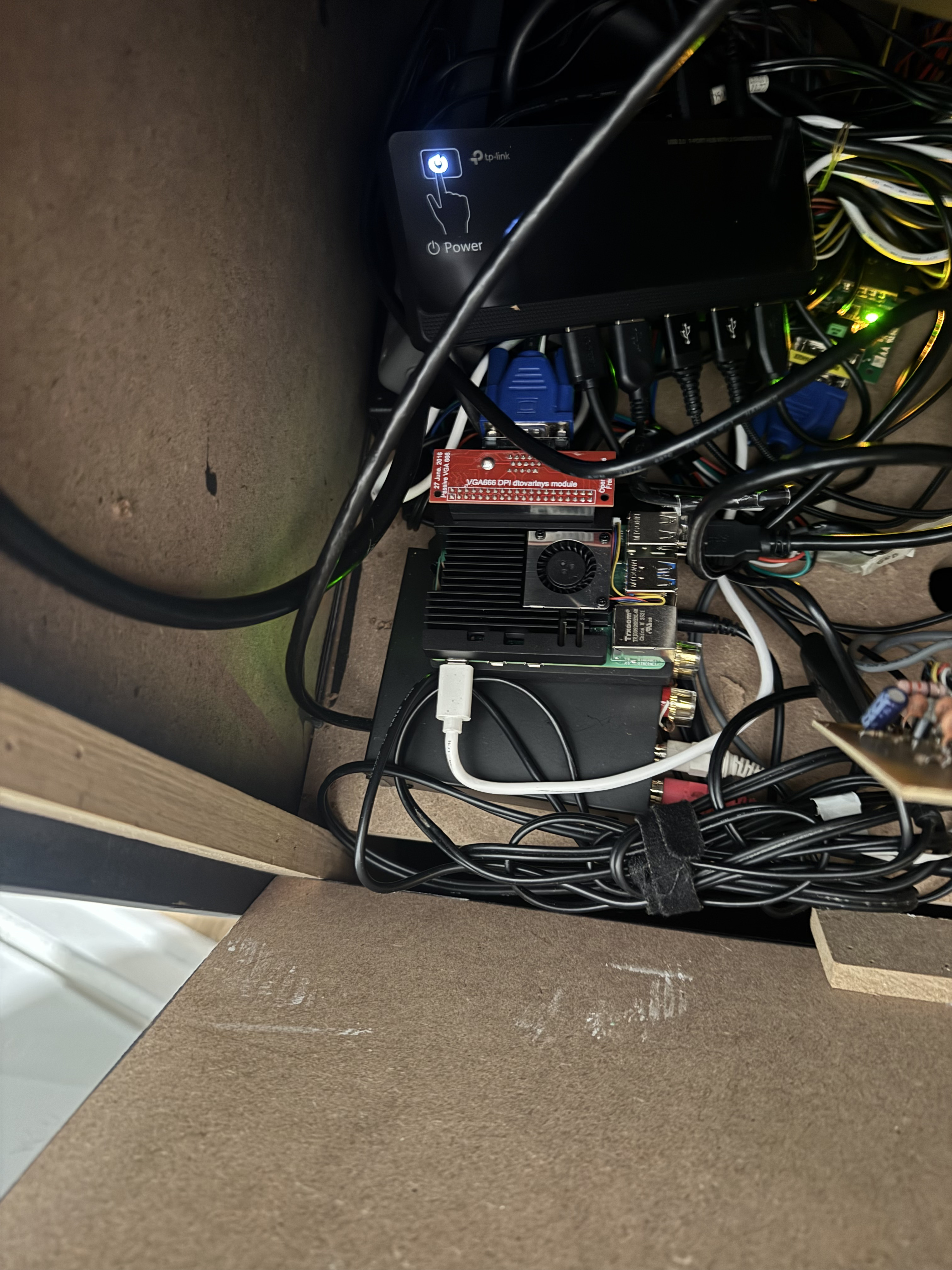 The Raspberry Pi 5 with vga666 adapter mounted inside the cabinet